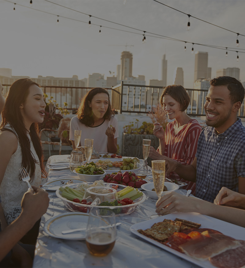 group out to dinner on rooftop patio