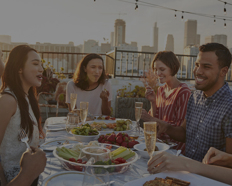 group out to dinner on rooftop patio