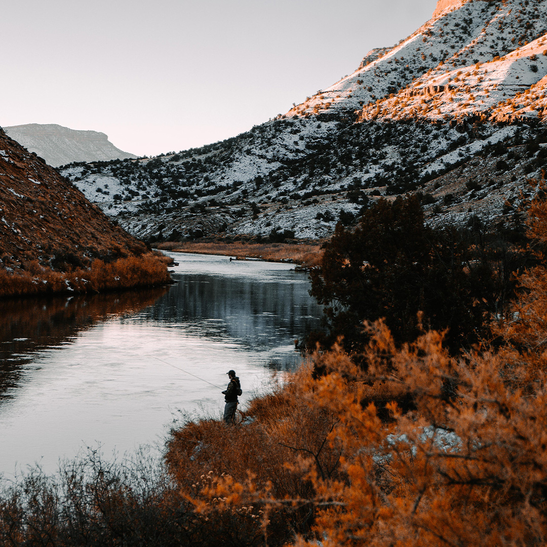 fisherman near a river
