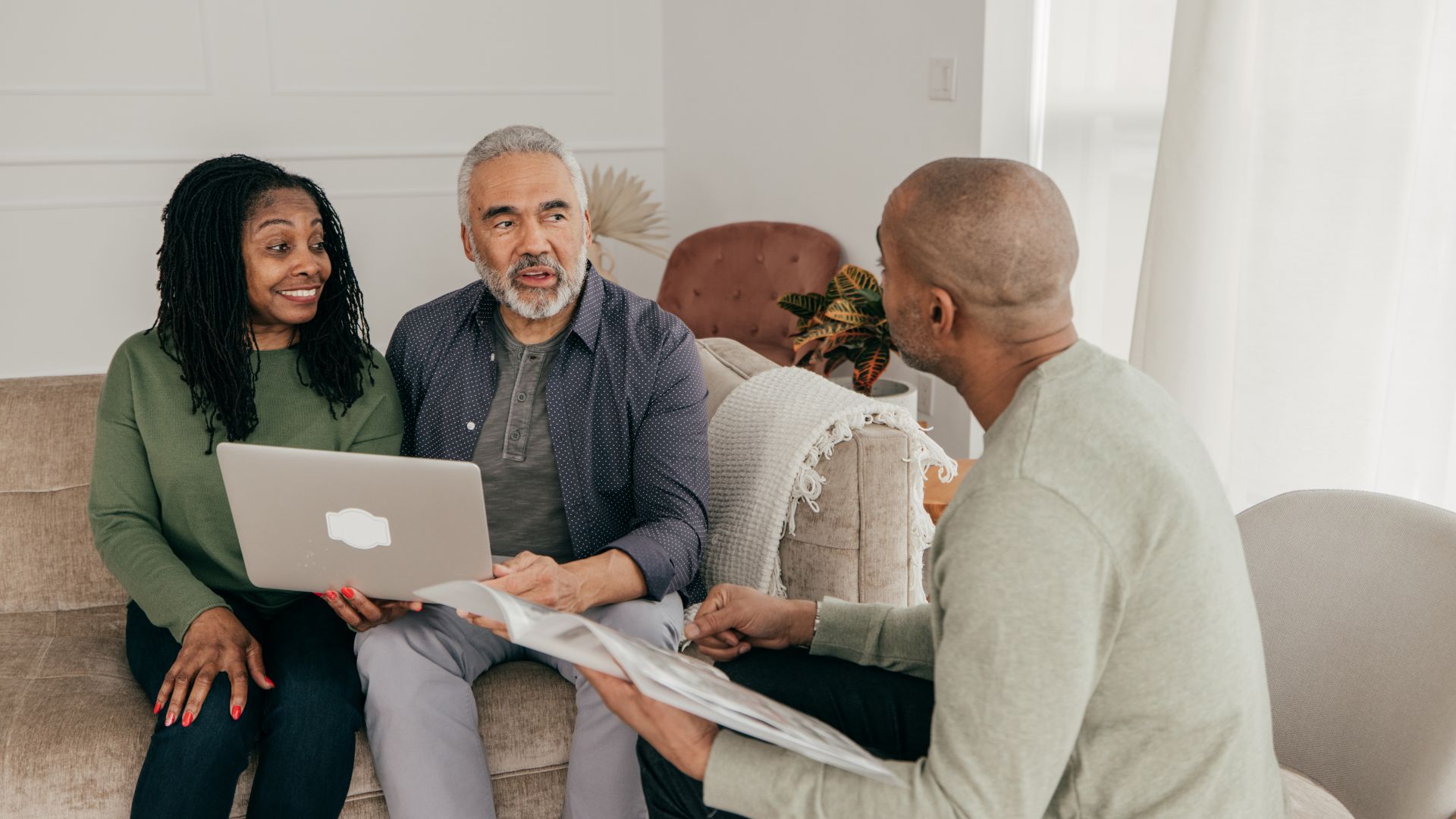 real estate agent meeting with couple