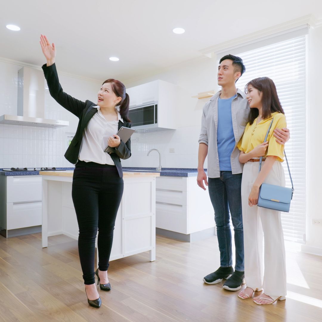 Realtor showing house to couple