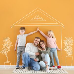 Young family posing in a dream home