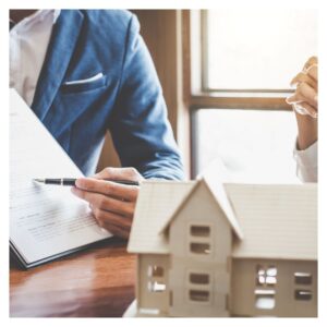 real estate agent showing paperwork