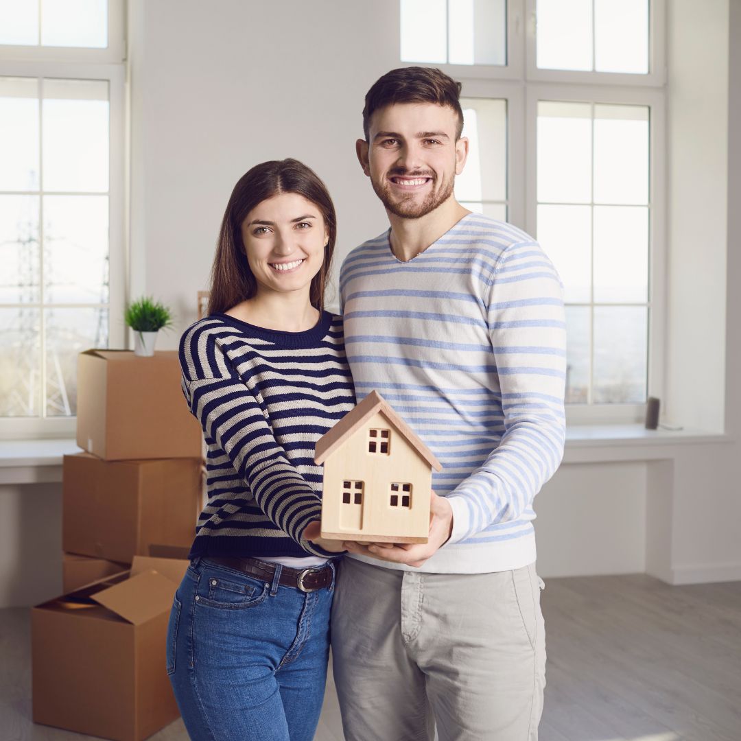 couple smiling in home